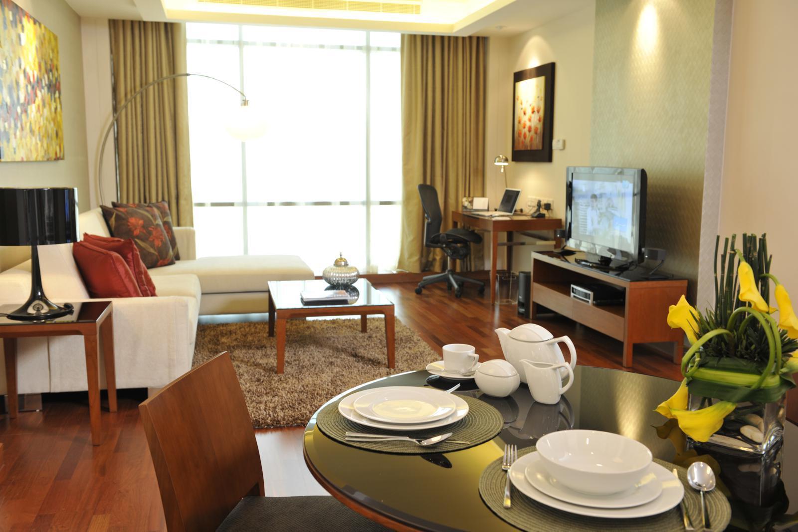 Fraser Suites Seef Bahrain Manama Zimmer foto A typical apartment interior