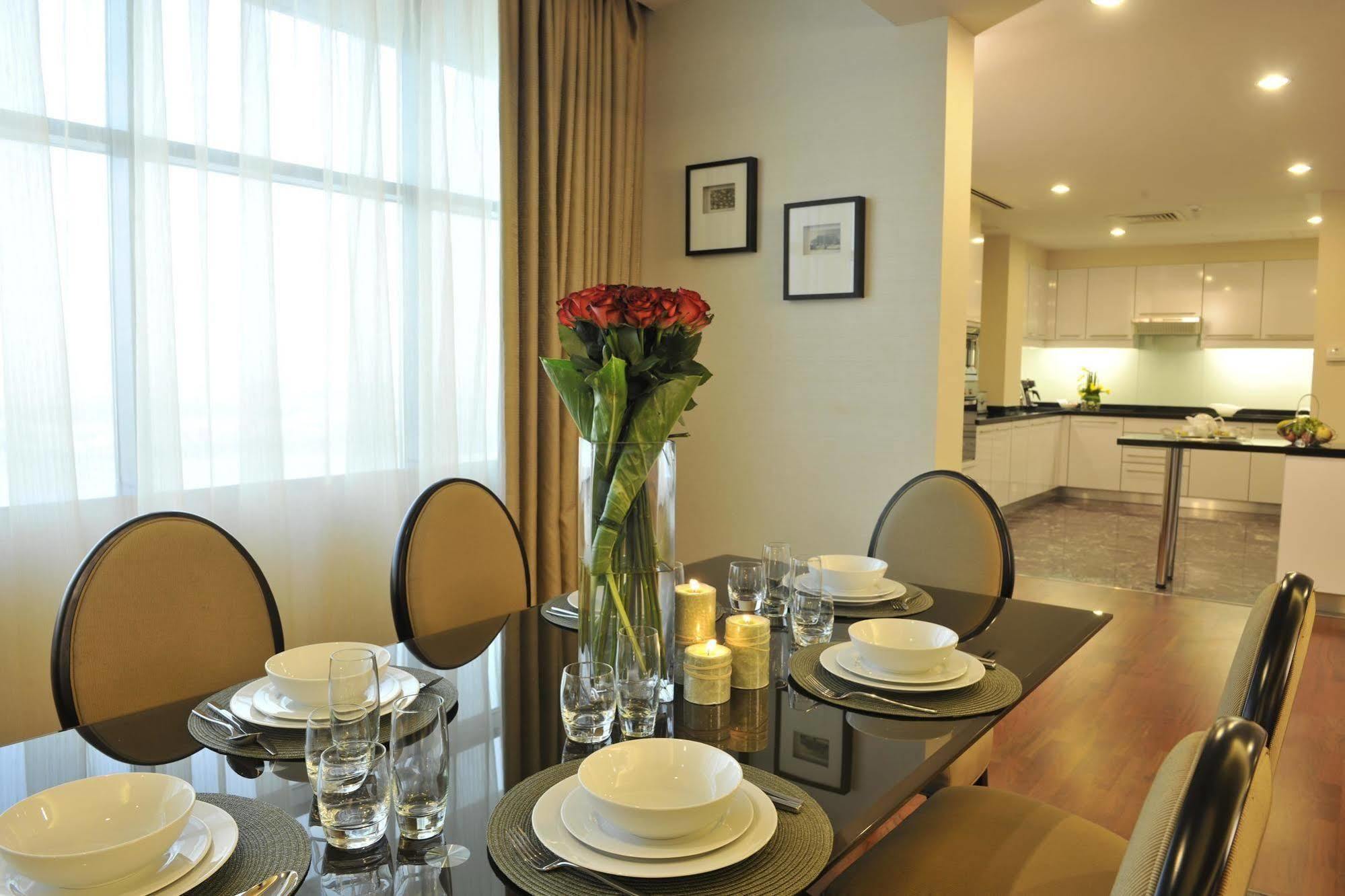 Fraser Suites Seef Bahrain Manama Zimmer foto A dining room